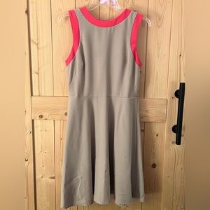 Sleeveless dress.  Linen feel.  Great for the office.  Falls below the knee.